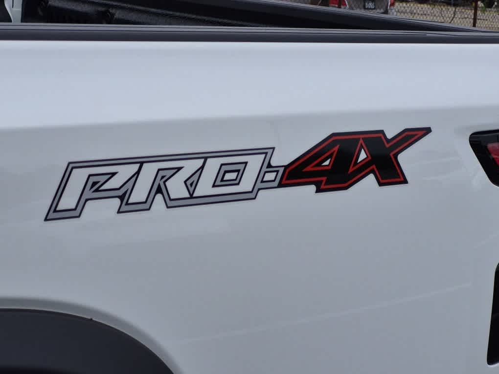 2026 Nissan Frontier PRO-4X - Glacier White exterior view 17