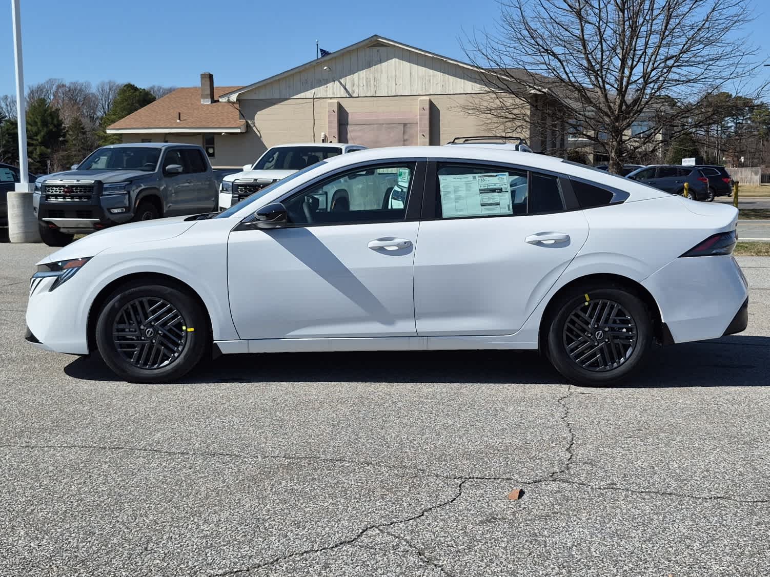 2026 Nissan Sentra SV - Fresh Powder exterior view 5