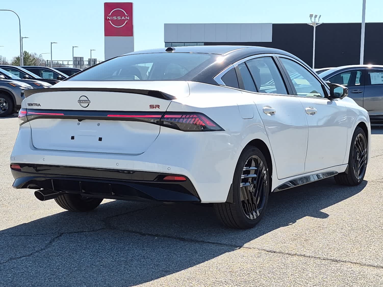 2026 Nissan Sentra SR - Aspen White Tricoat/Super Black exterior view 3