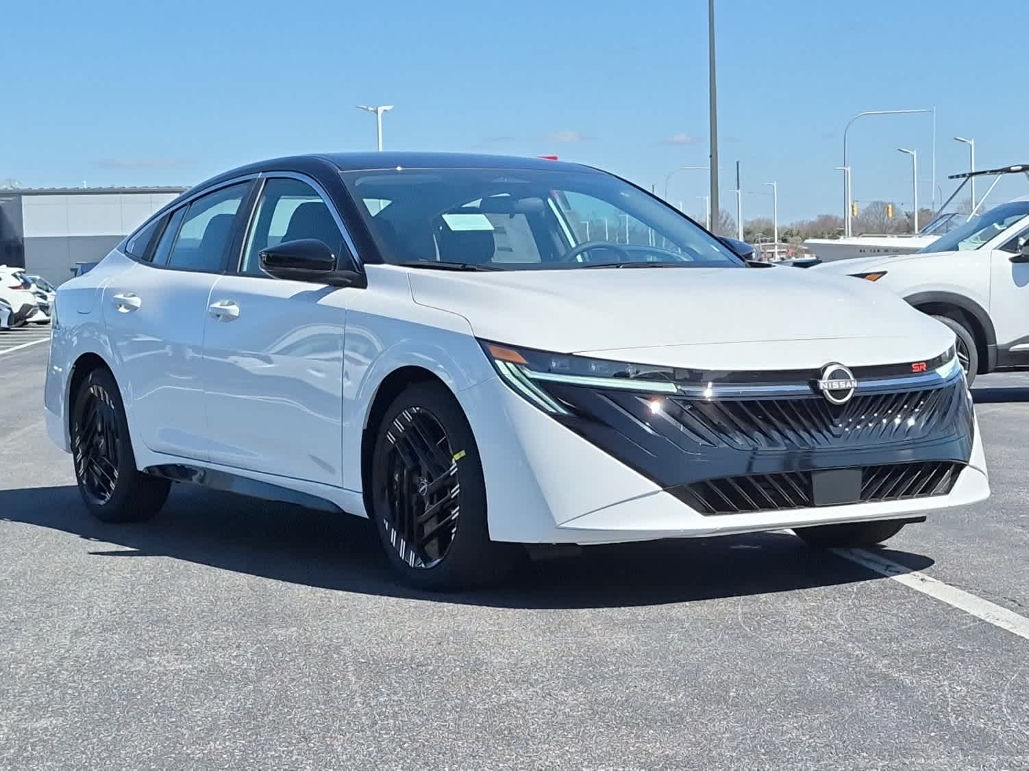 2026 Nissan Sentra SR - Aspen White Tricoat/Super Black exterior view 2