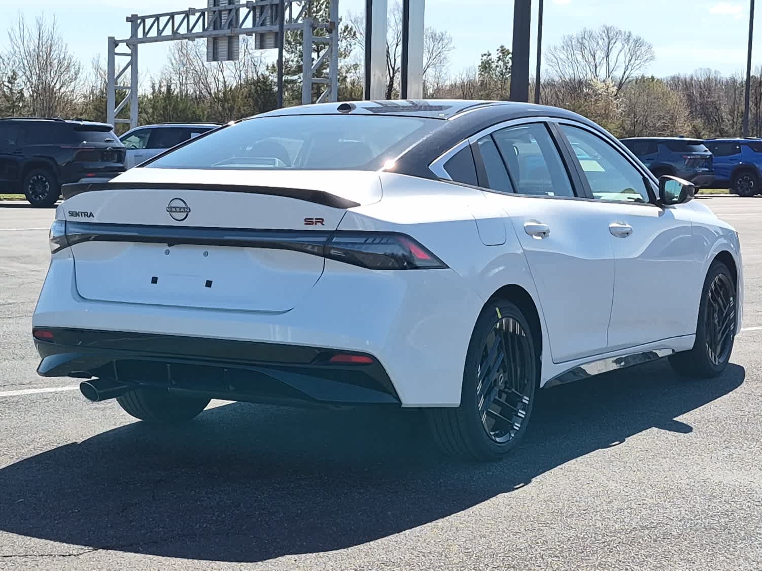 2026 Nissan Sentra SR - Aspen White Tricoat/Super Black exterior view 3