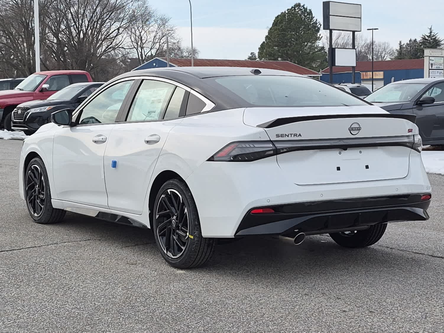 2026 Nissan Sentra SR - Aspen White Tricoat/Super Black exterior view 4
