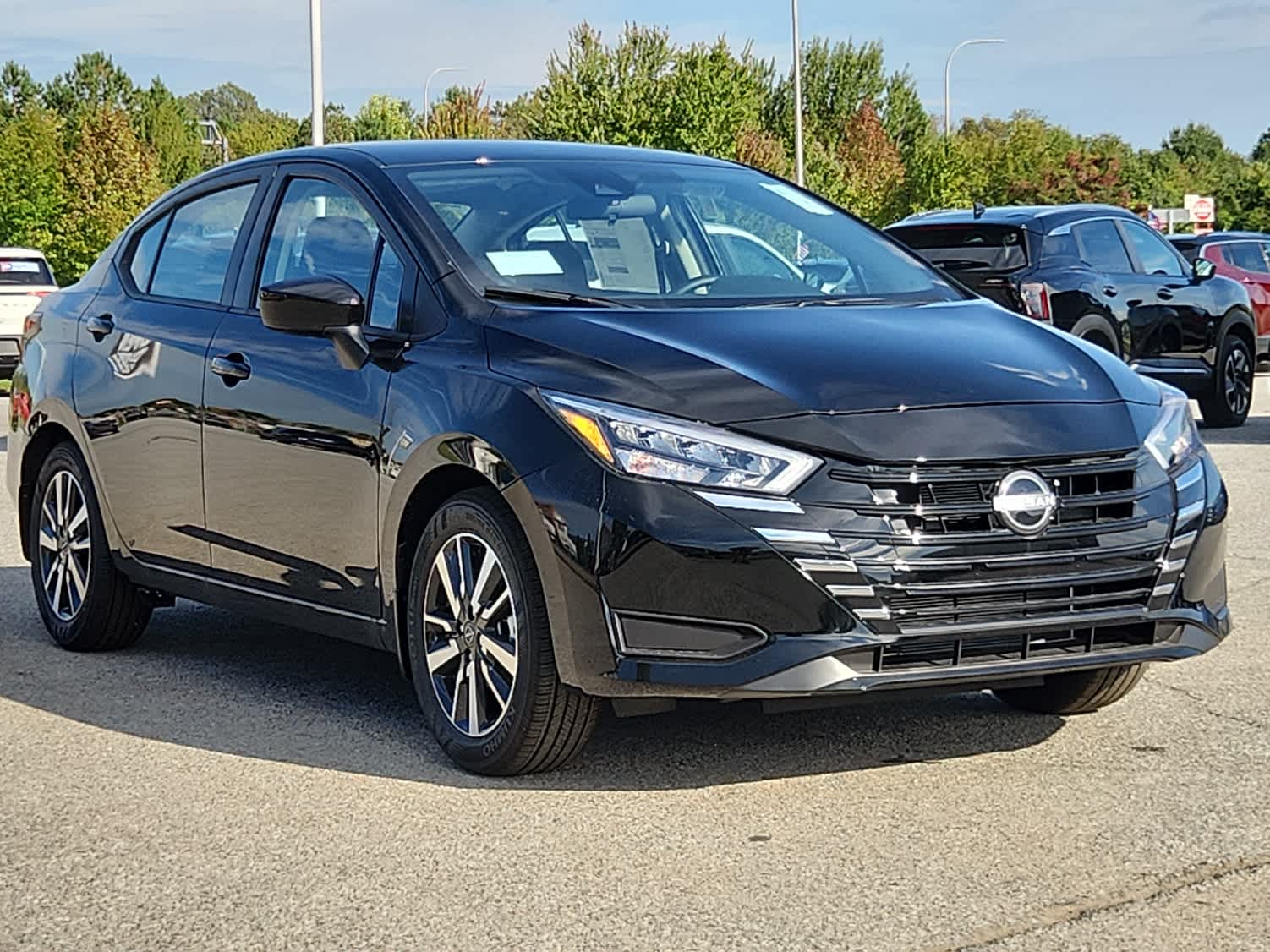 2025 Nissan Versa SV - Super Black exterior view 2