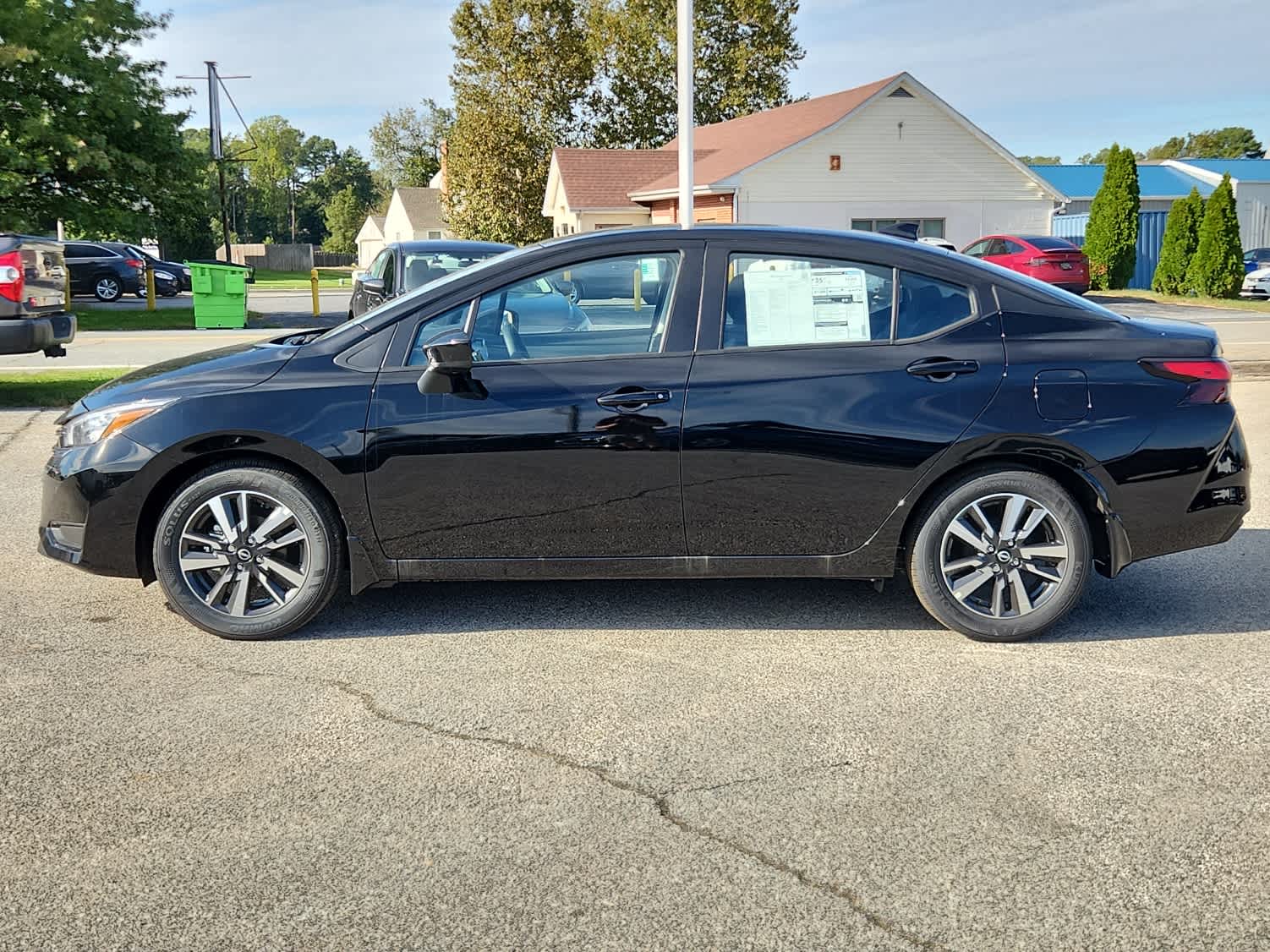 2025 Nissan Versa SV - Super Black exterior view 5