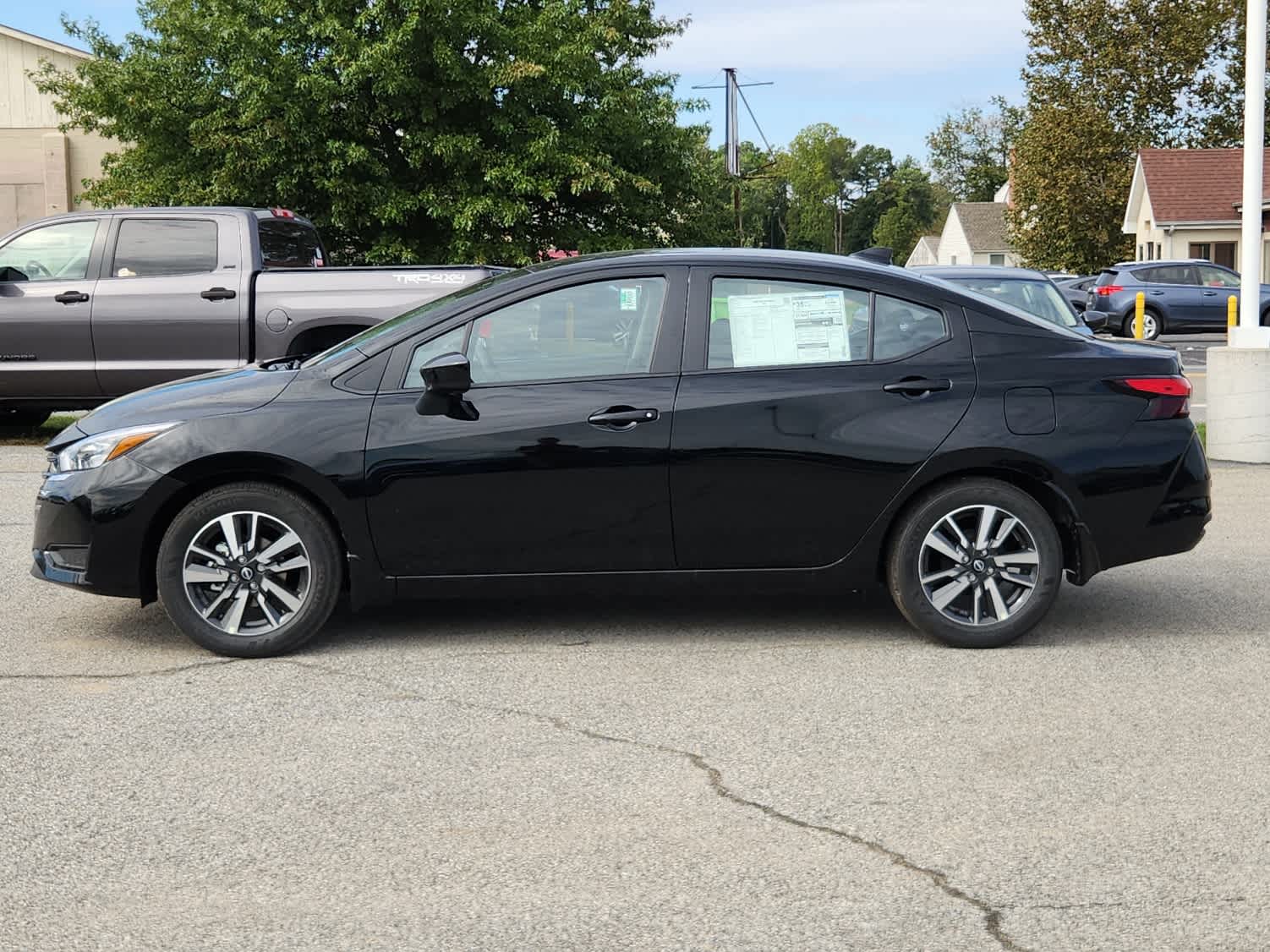 2025 Nissan Versa SV - Super Black exterior view 4