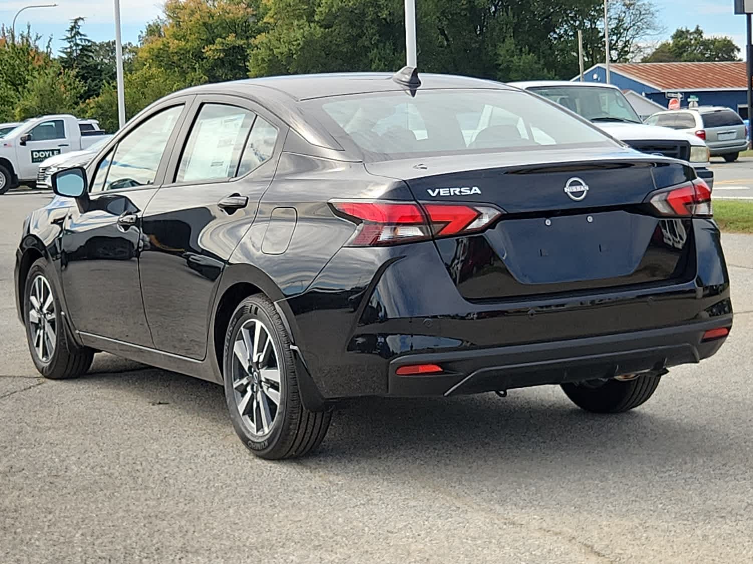 2025 Nissan Versa SV - Super Black exterior view 3