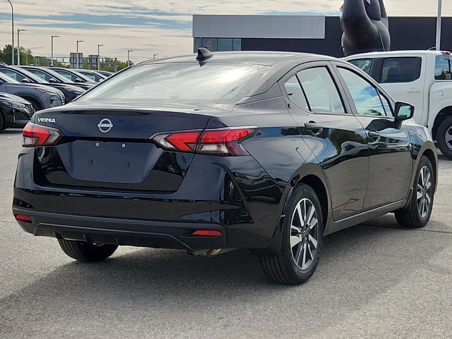 2025 Nissan Versa SV - Super Black exterior view 2