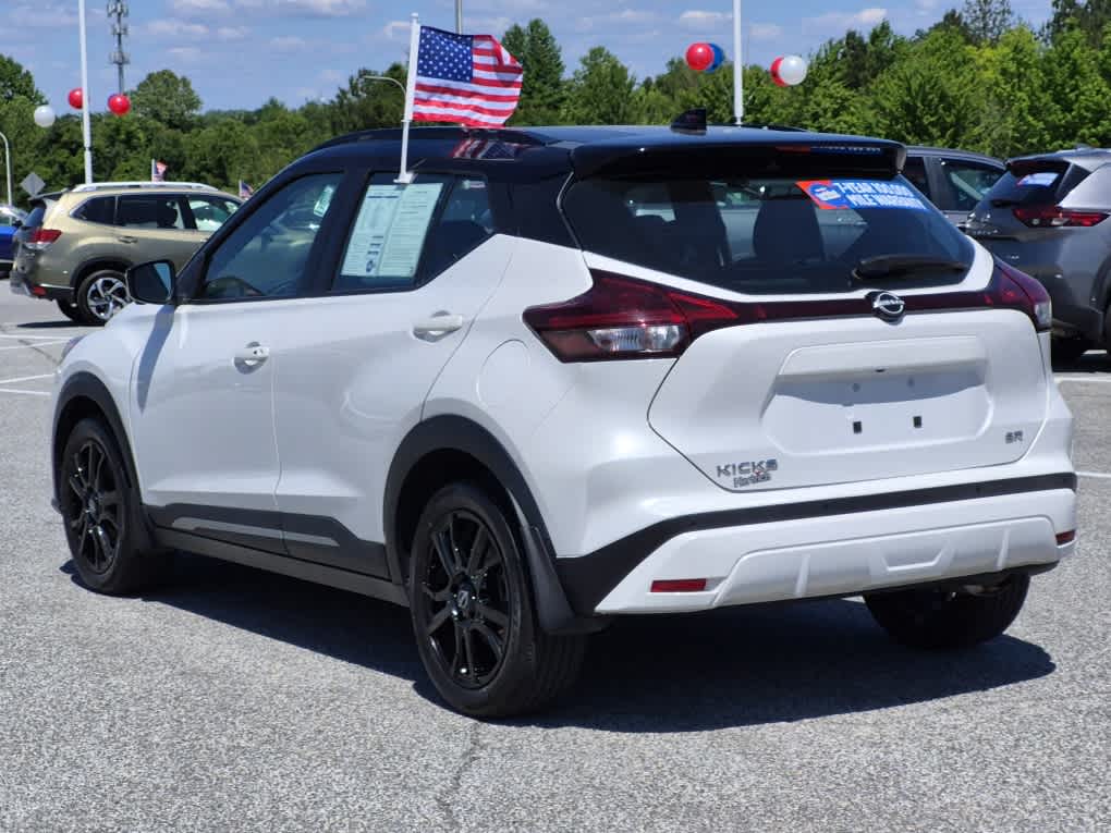 2023 Nissan Kicks SR - Aspen White Tricoat/Super Black exterior view 4