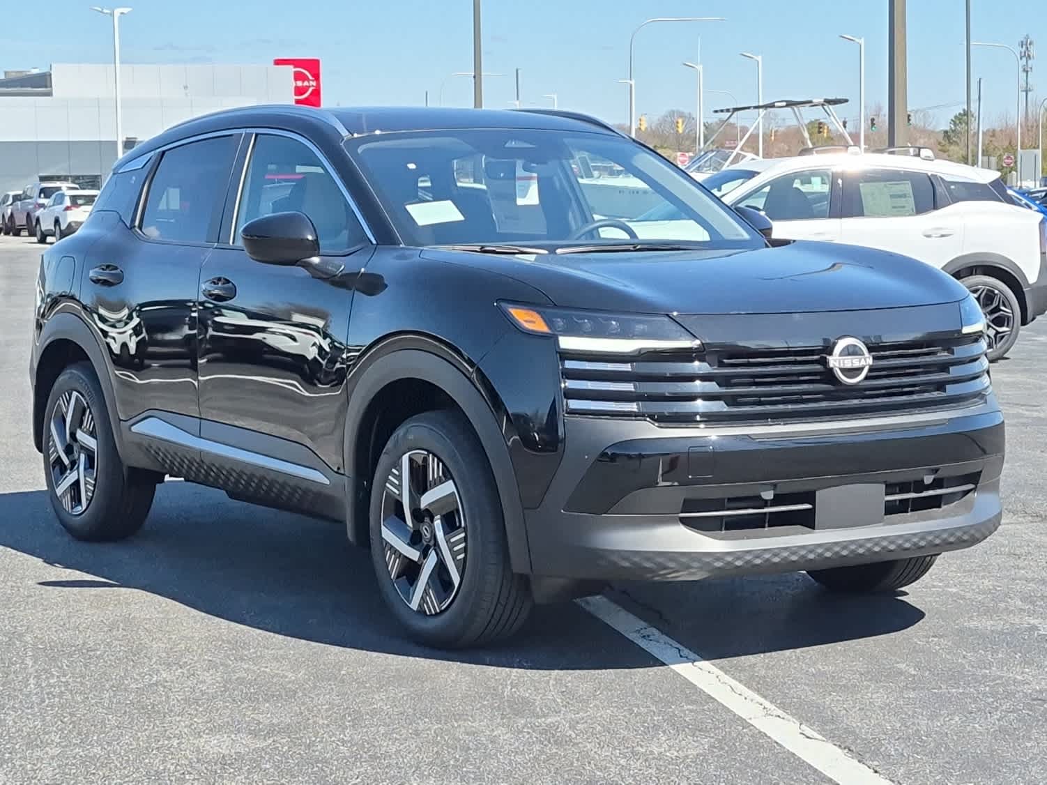 2026 Nissan Kicks SV - Super Black exterior view 2