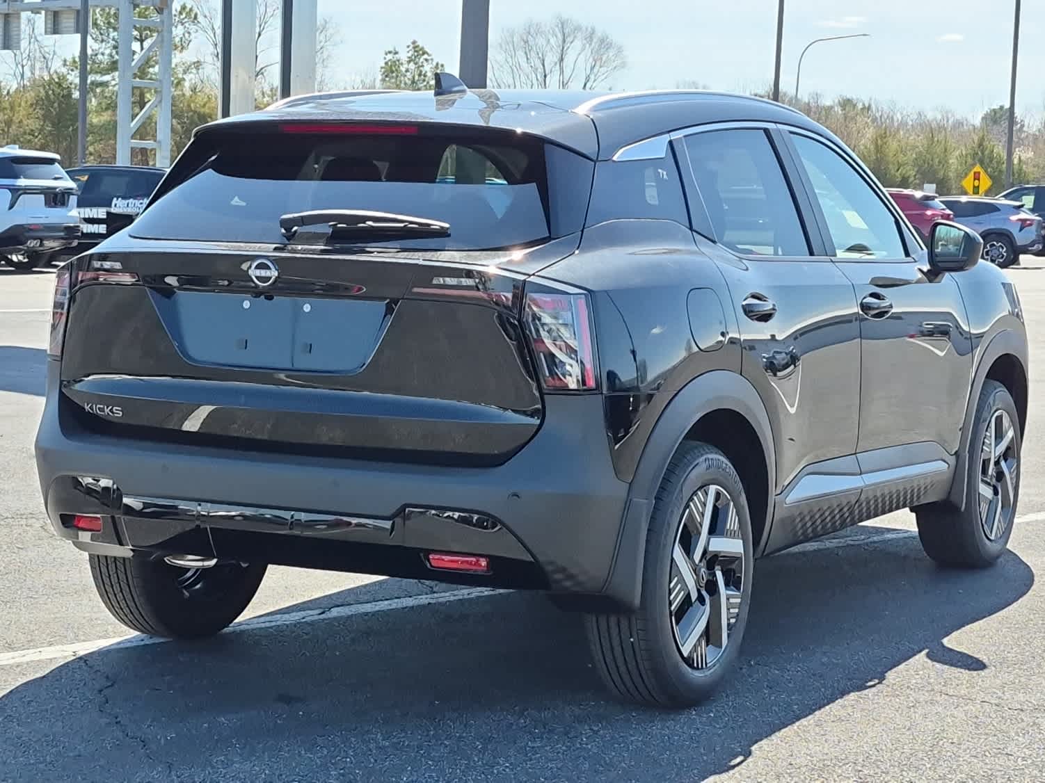 2026 Nissan Kicks SV - Super Black exterior view 3