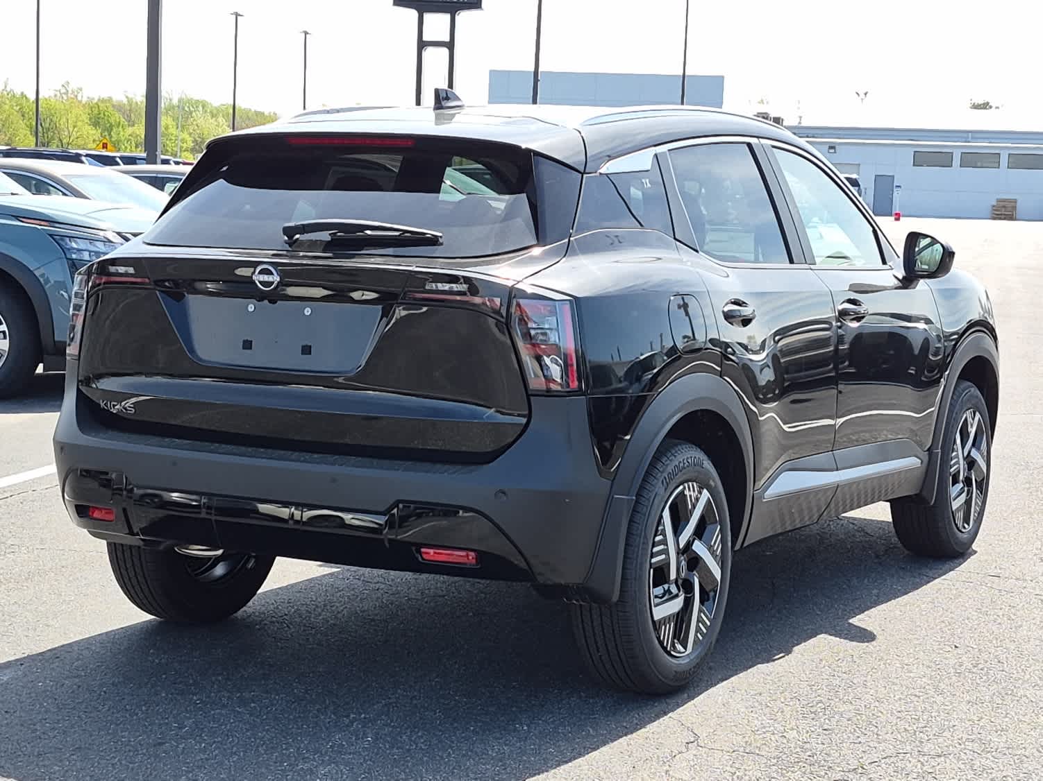 2026 Nissan Kicks SV - Super Black exterior view 3