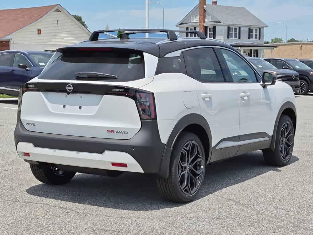 2026 Nissan Kicks SR - Aspen White Tricoat/Super Black exterior view 3
