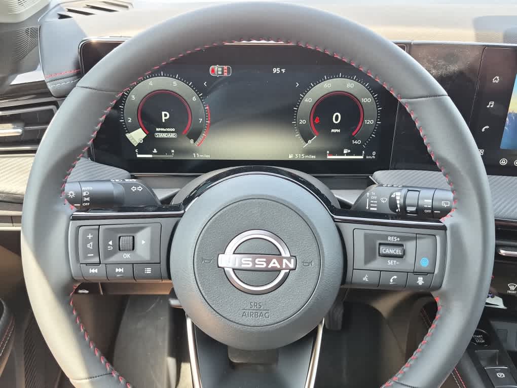 2026 Nissan Kicks SR - Arctic Ice Blue Metallic/Super Black exterior view 15