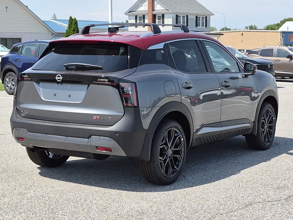2026 Nissan Kicks SR - Gun Metallic/Scarlet Ember Tintcoat exterior view 3