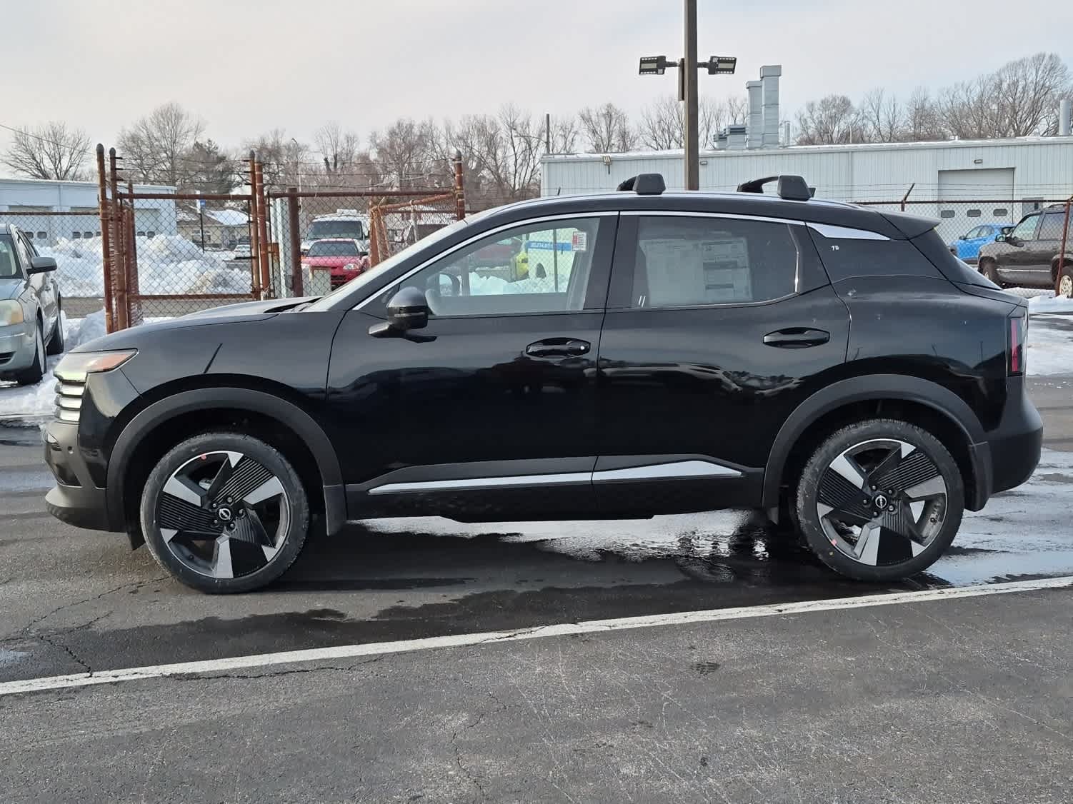 2026 Nissan Kicks SR - Super Black exterior view 5