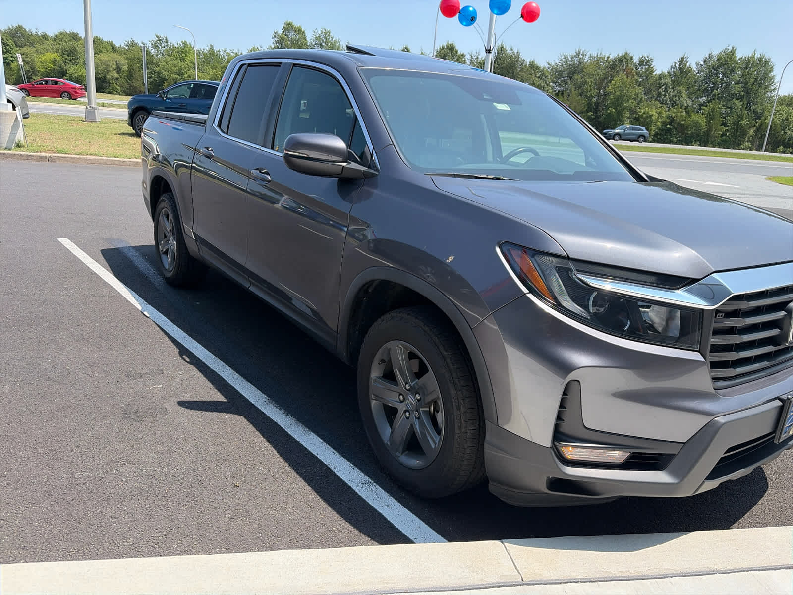2023 Honda Ridgeline RTL - Modern Steel Metallic exterior view 2