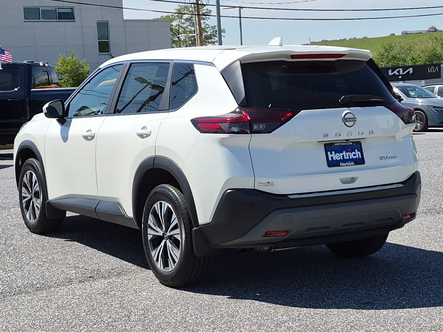 2023 Nissan Rogue SV - Pearl White Tricoat exterior view 4