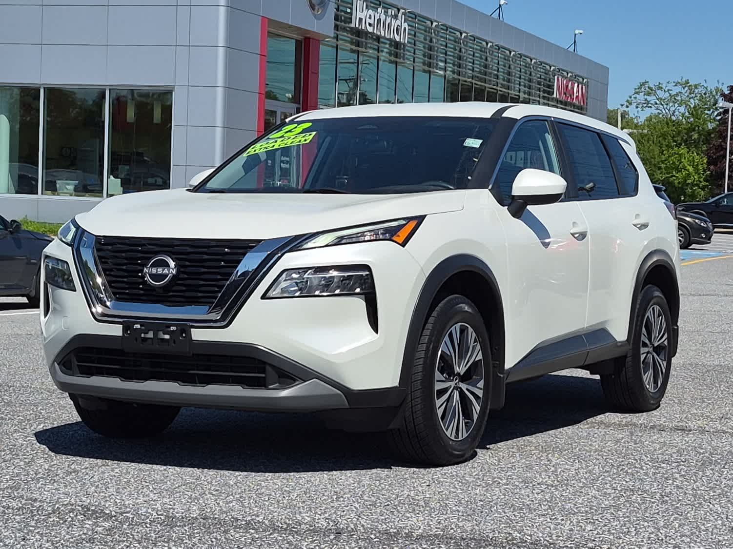 2023 Nissan Rogue SV - Pearl White Tricoat exterior view 1