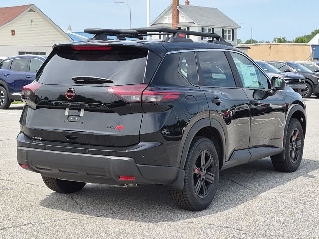 2026 Nissan Rogue Rock Creek - Super Black exterior view 3