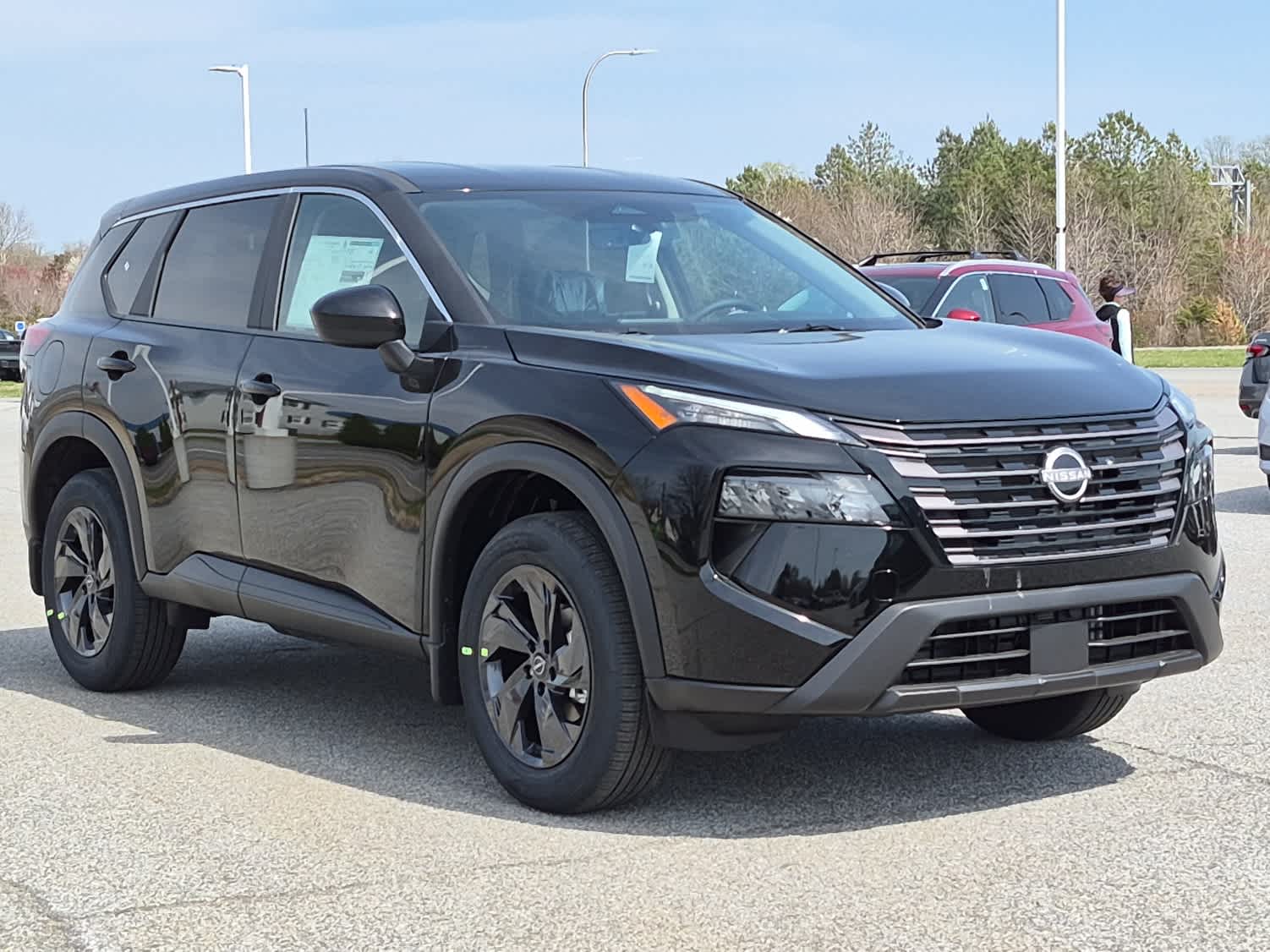 2026 Nissan Rogue SV - Super Black exterior view 2