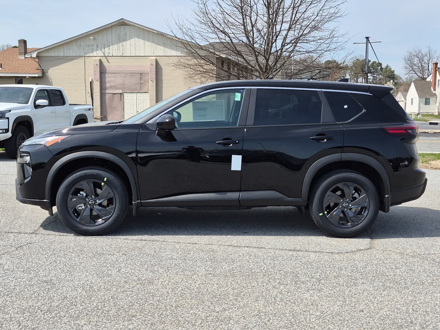 2026 Nissan Rogue SV - Super Black exterior view 5