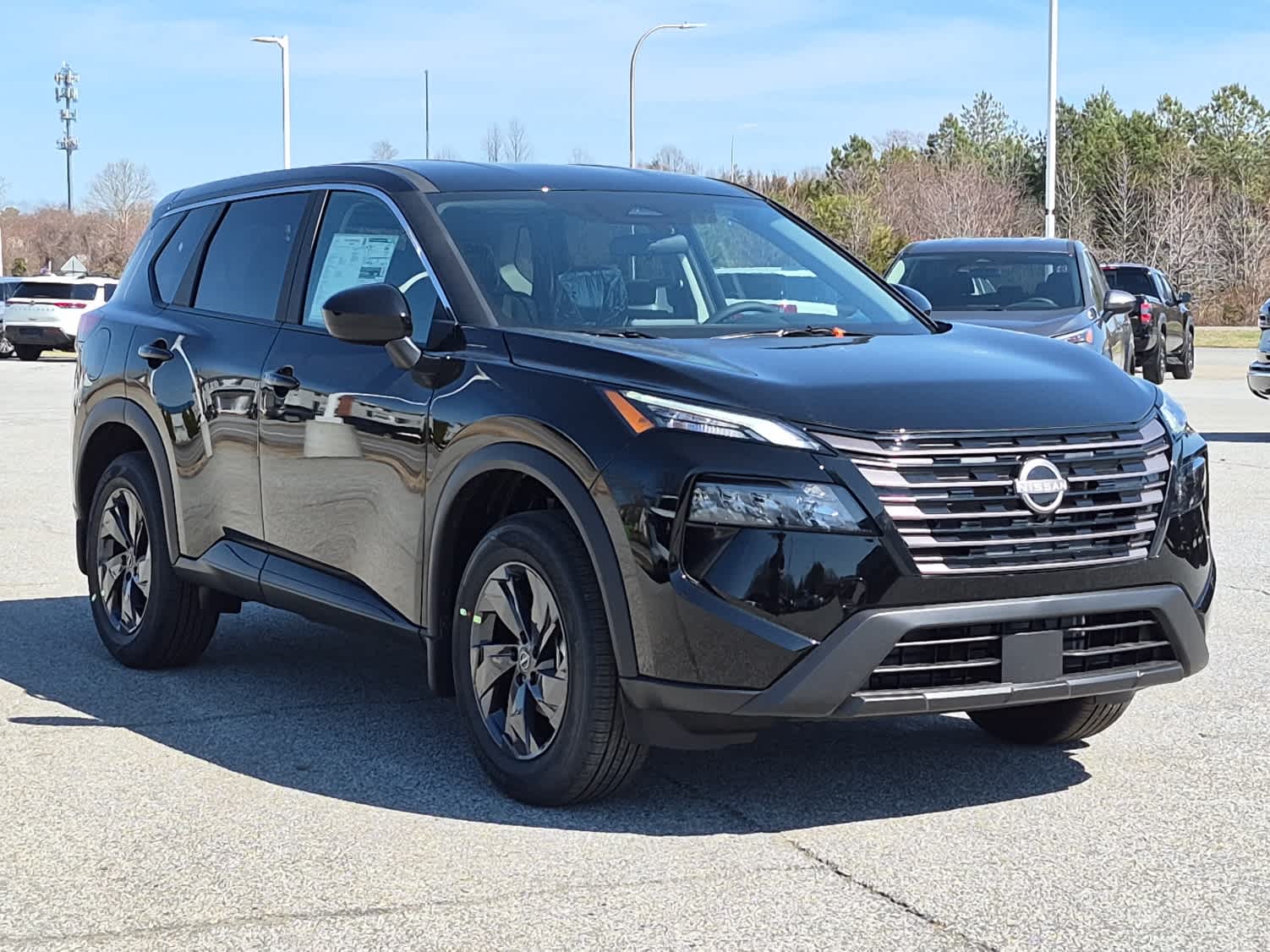 2026 Nissan Rogue SV - Super Black exterior view 2