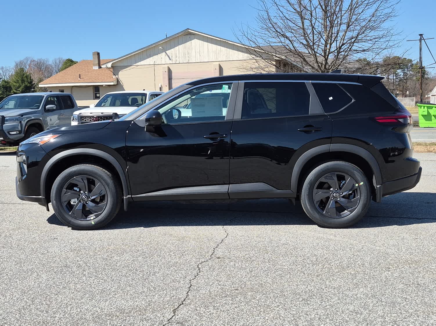 2026 Nissan Rogue SV - Super Black exterior view 5