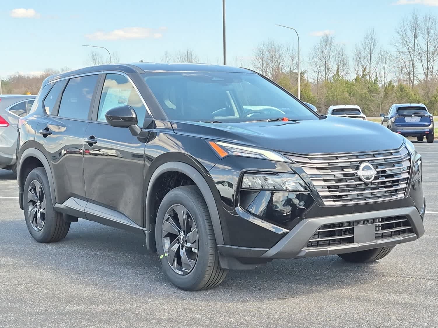2026 Nissan Rogue SV - Super Black exterior view 2