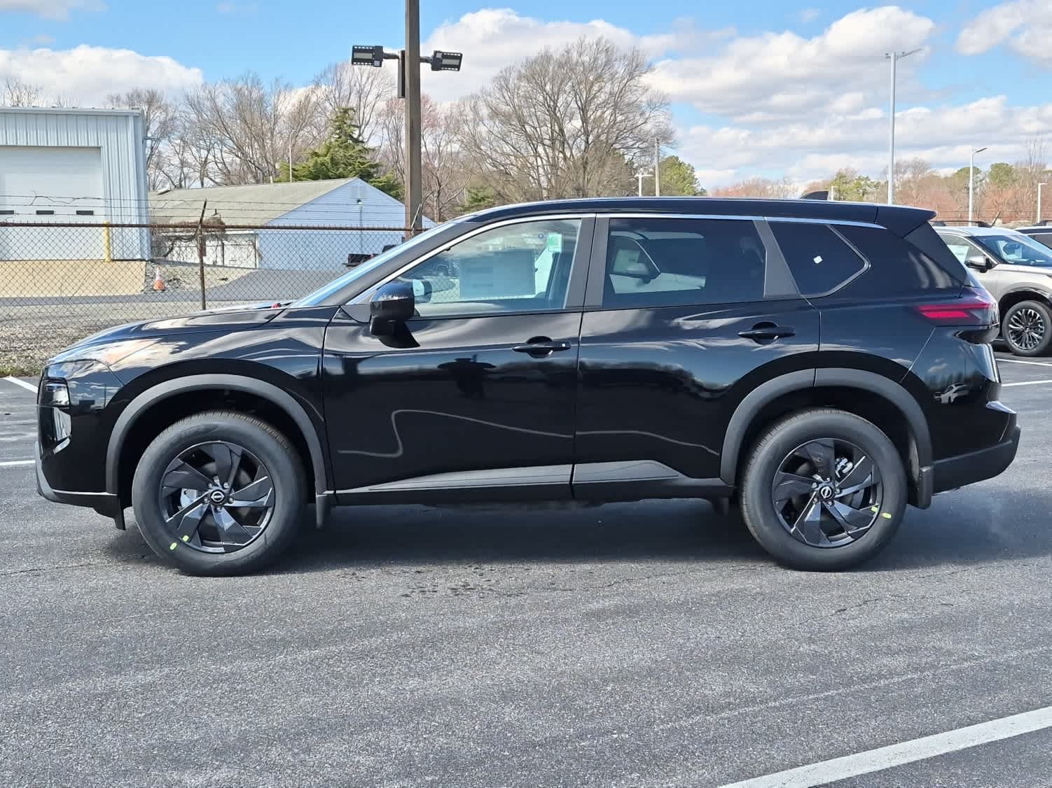 2026 Nissan Rogue SV - Super Black exterior view 5