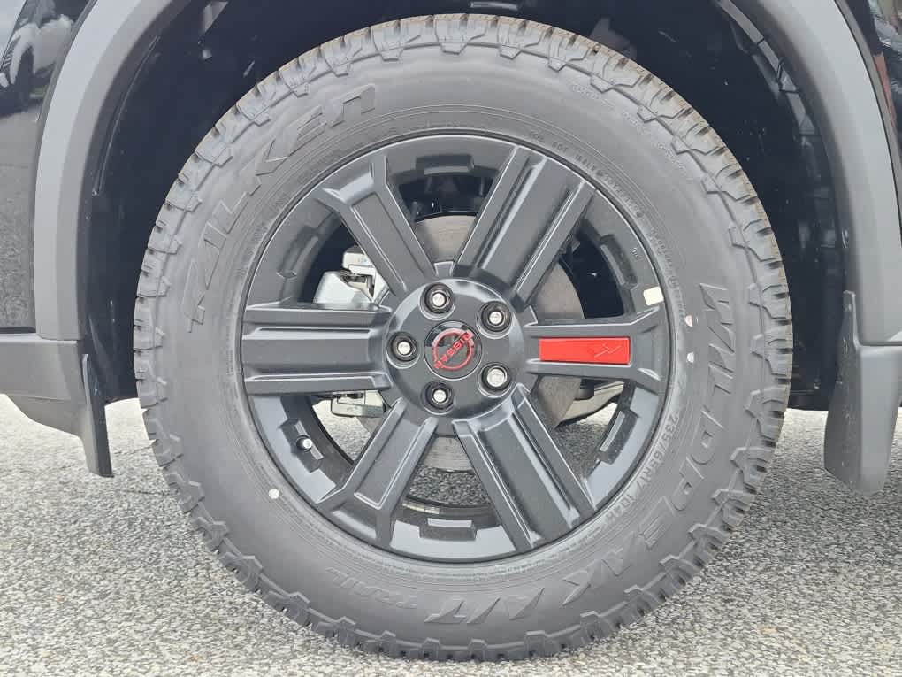 2026 Nissan Rogue Rock Creek - Super Black exterior view 6