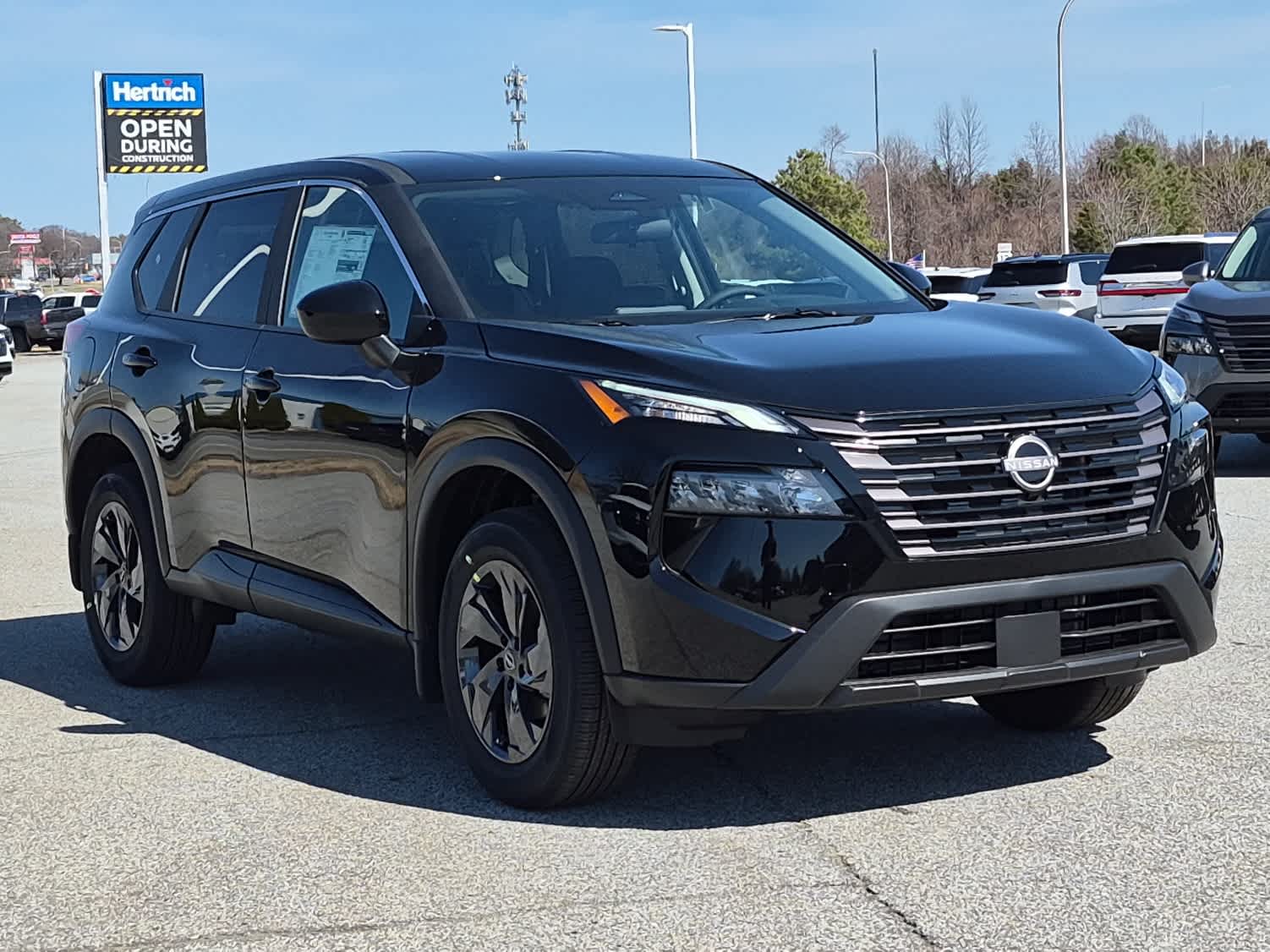 2026 Nissan Rogue SV - Super Black exterior view 2
