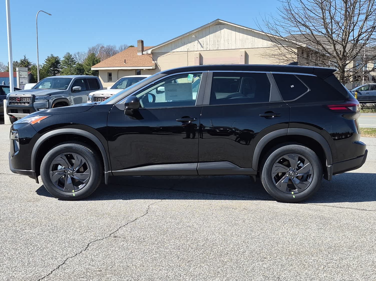 2026 Nissan Rogue SV - Super Black exterior view 5