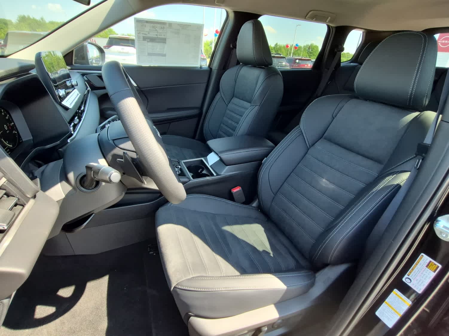 2026 Nissan Rogue Plug-In Hybrid SL - Cosmic Black exterior view 10