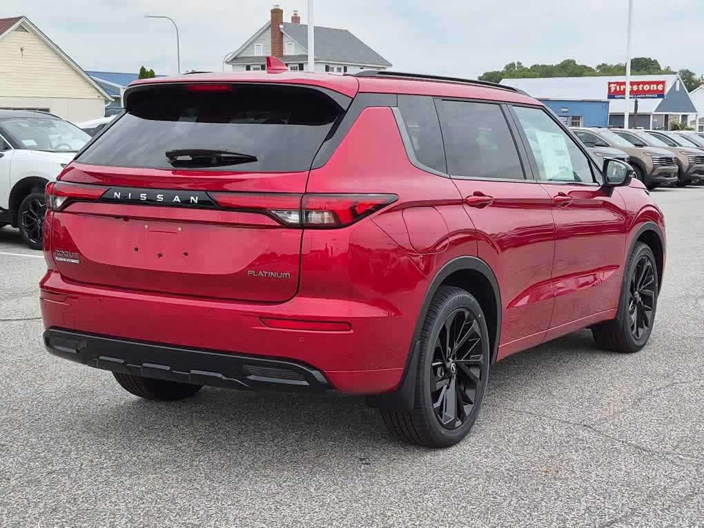2026 Nissan Rogue Plug-In Hybrid Platinum - Royal Red exterior view 3