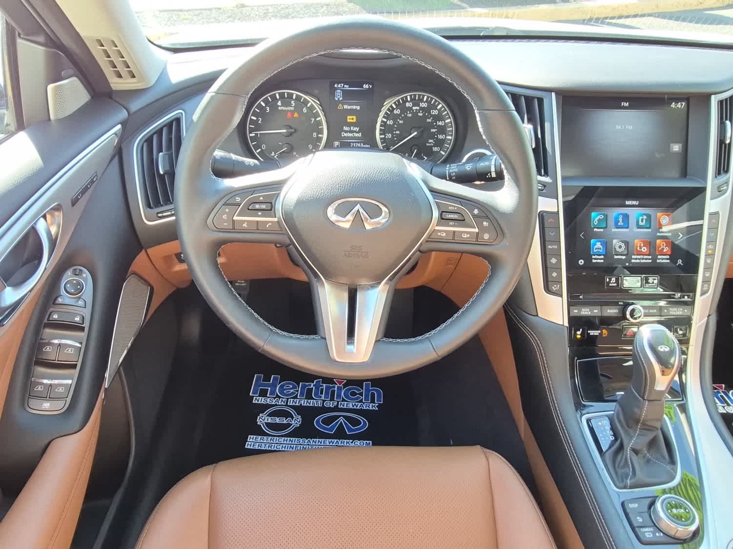 2023 INFINITI Q50 LUXE - Majestic White exterior view 8