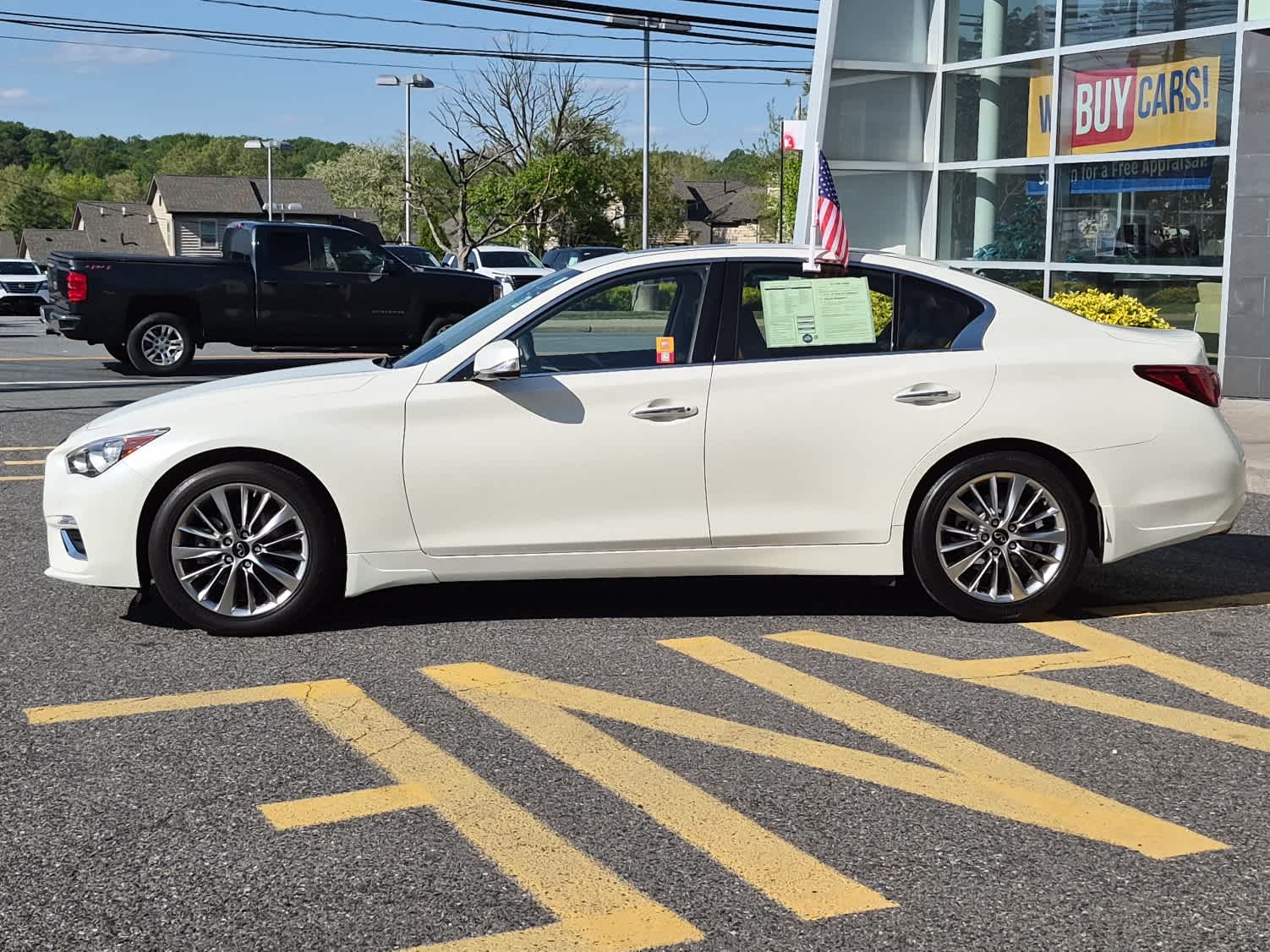 2023 INFINITI Q50 LUXE - Majestic White exterior view 5