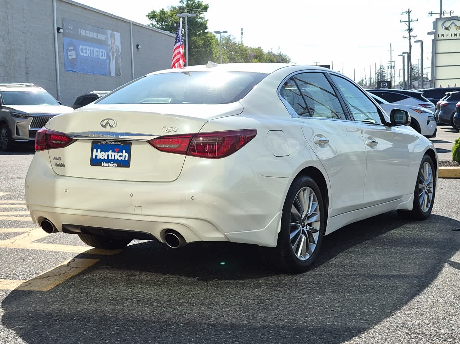 2023 INFINITI Q50 LUXE - Majestic White exterior view 3