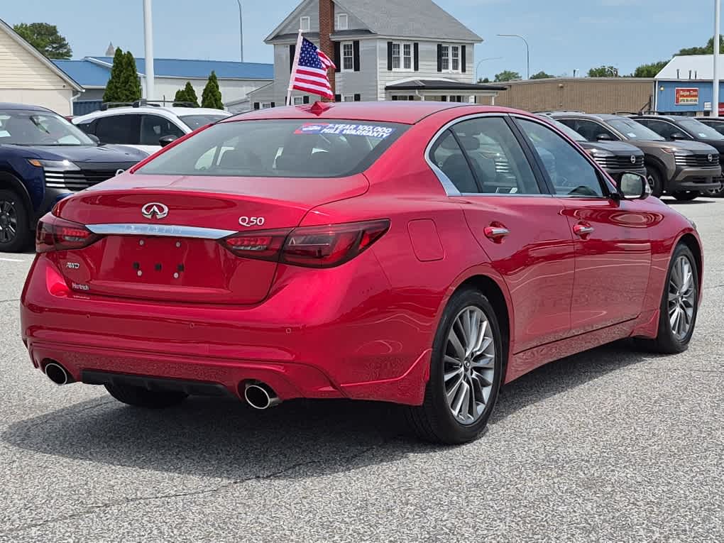 2023 INFINITI Q50 LUXE - Dynamic Sunstone Red exterior view 3