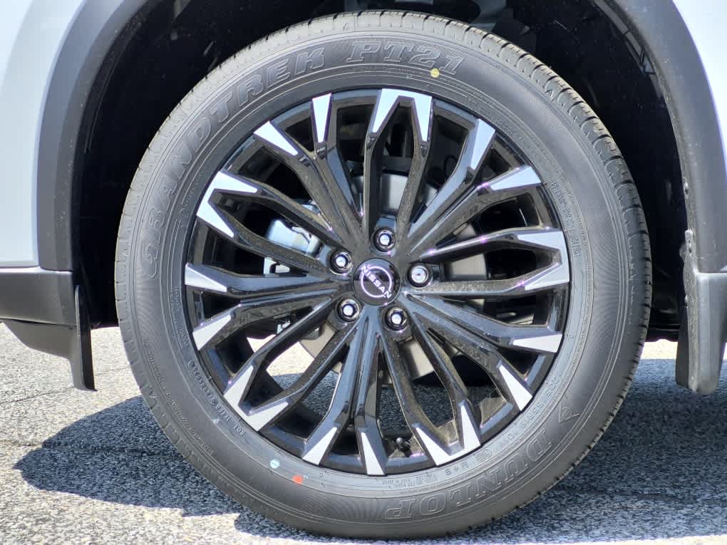 2026 Nissan Rogue Dark Armor - Everest White Pearl Tricoat exterior view 6