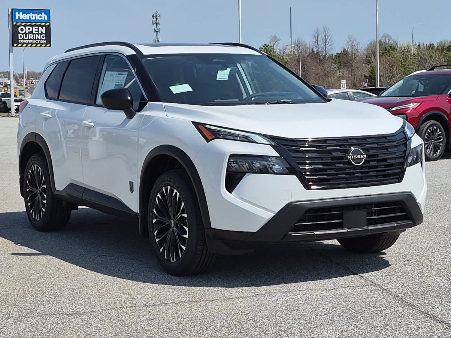 2026 Nissan Rogue Dark Armor - Everest White Pearl Tricoat exterior view 2