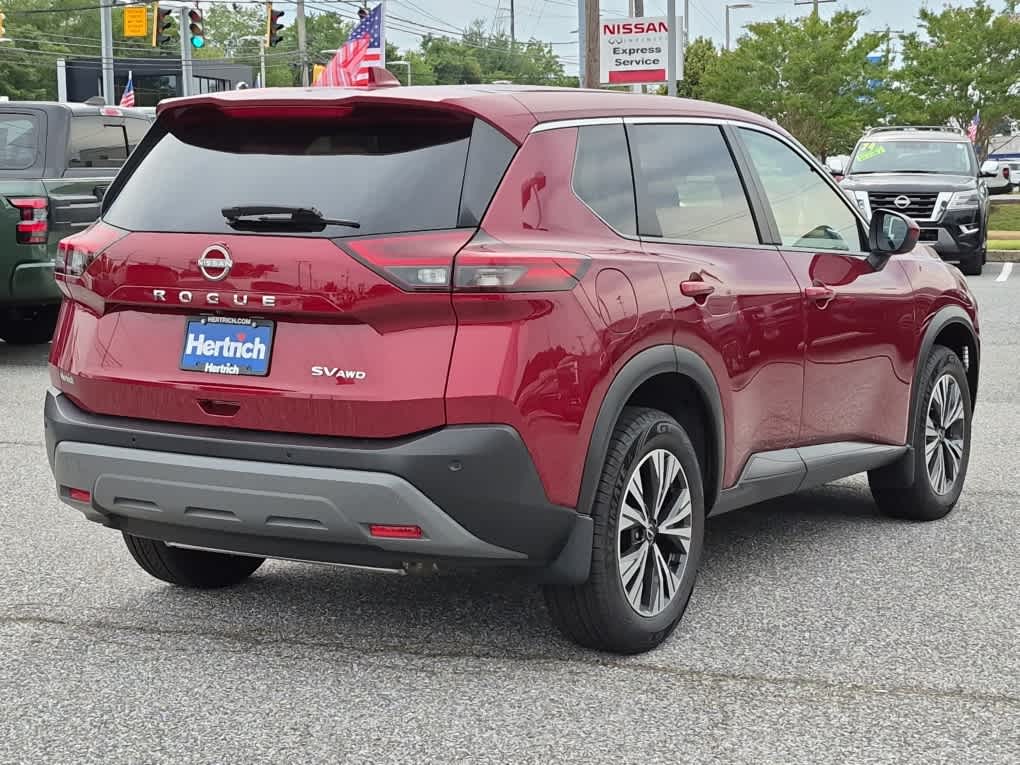 2023 Nissan Rogue SV - Scarlet Ember Tintcoat exterior view 3
