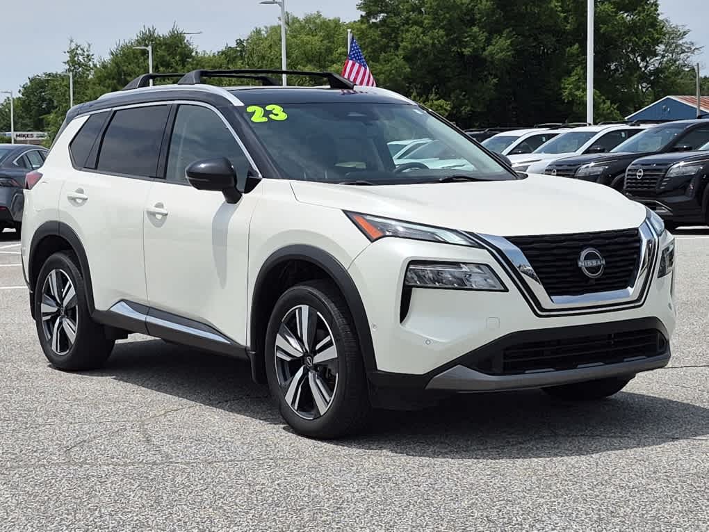 2023 Nissan Rogue SL - Pearl White Tricoat/Super Black exterior view 2