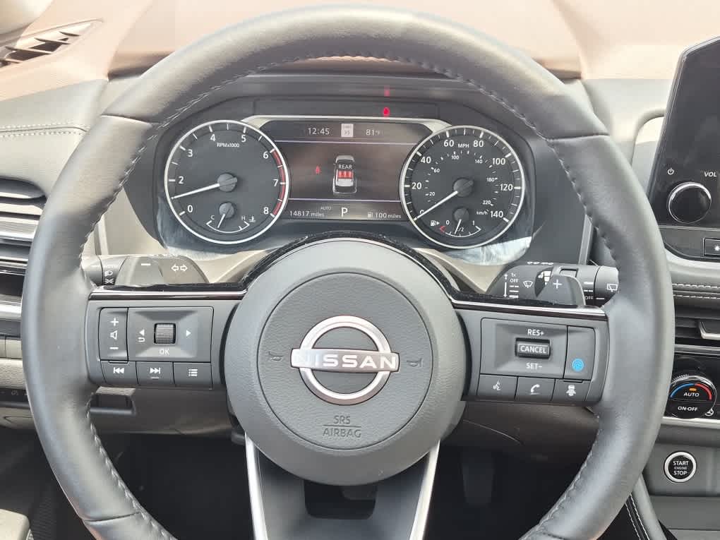 2023 Nissan Rogue SL - Pearl White Tricoat/Super Black exterior view 17