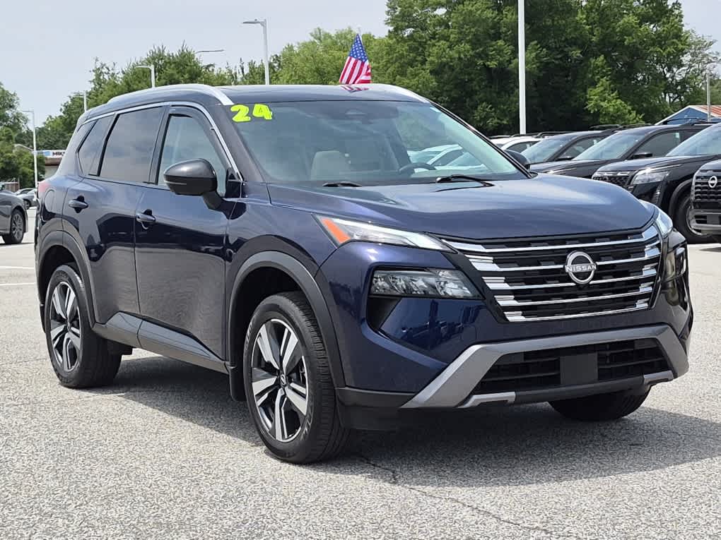 2024 Nissan Rogue SL - Deep Ocean Blue Pearl/Super Black exterior view 2