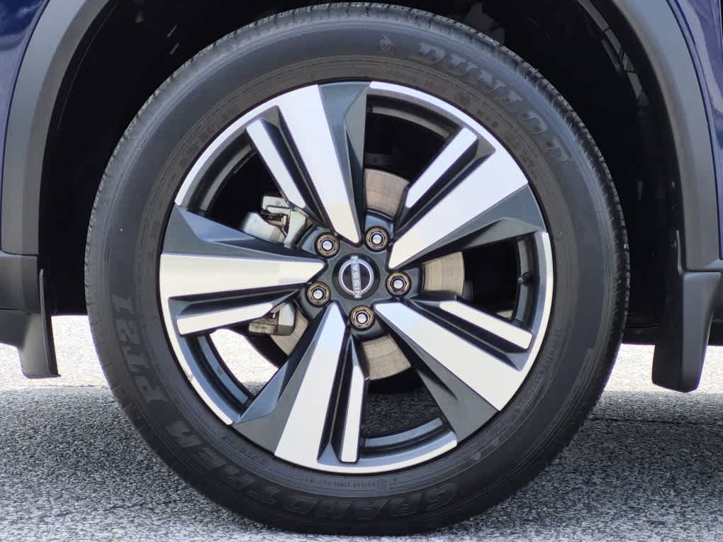 2024 Nissan Rogue SL - Deep Ocean Blue Pearl/Super Black exterior view 6