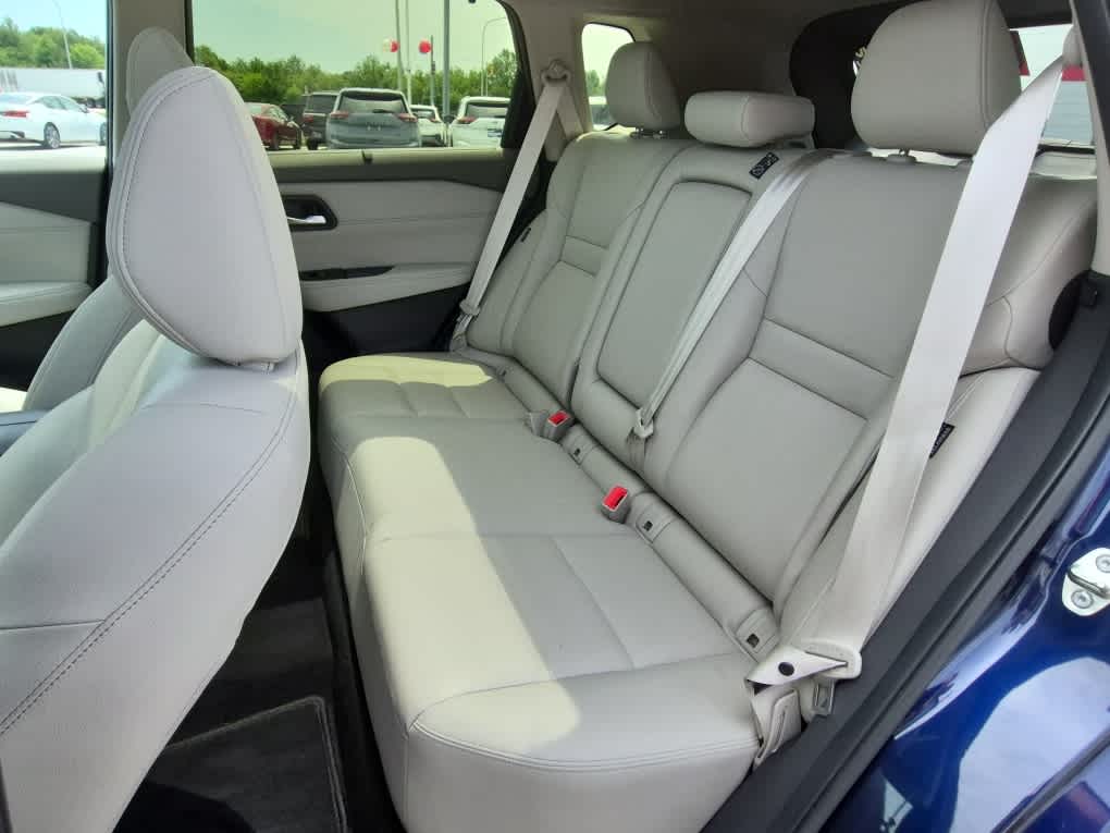 2024 Nissan Rogue SL - Deep Ocean Blue Pearl/Super Black exterior view 7