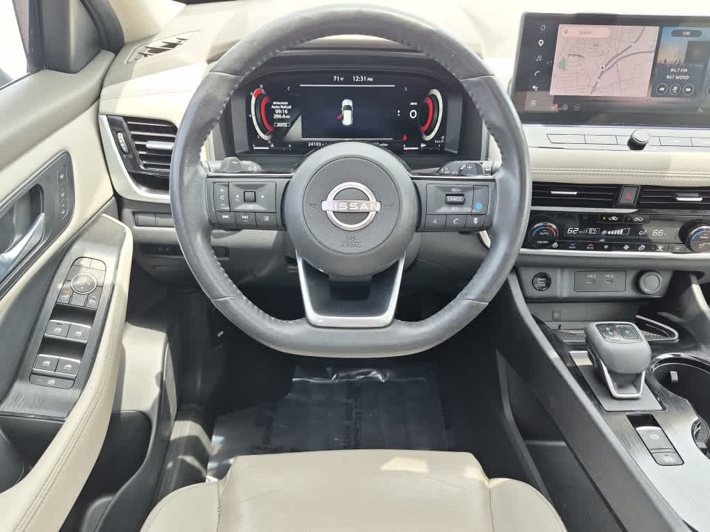 2024 Nissan Rogue SL - Deep Ocean Blue Pearl/Super Black exterior view 9