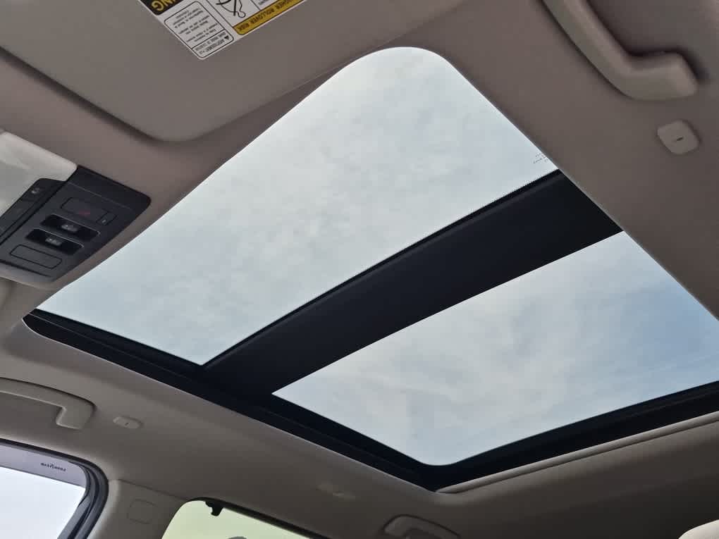 2024 Nissan Rogue SL - Deep Ocean Blue Pearl/Super Black exterior view 13