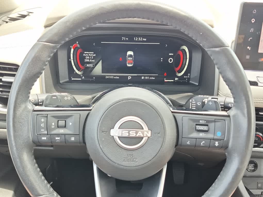 2024 Nissan Rogue SL - Deep Ocean Blue Pearl/Super Black exterior view 18