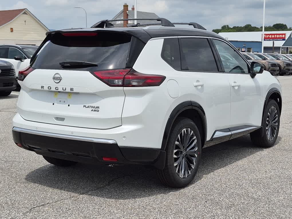 2026 Nissan Rogue Platinum - Everest White Pearl/Super Black exterior view 3